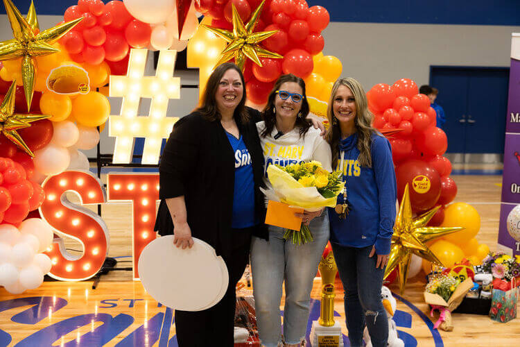 Teacher posing with collegues